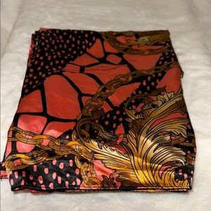 Elegant Silk Scarf with Gold and Black Pattern